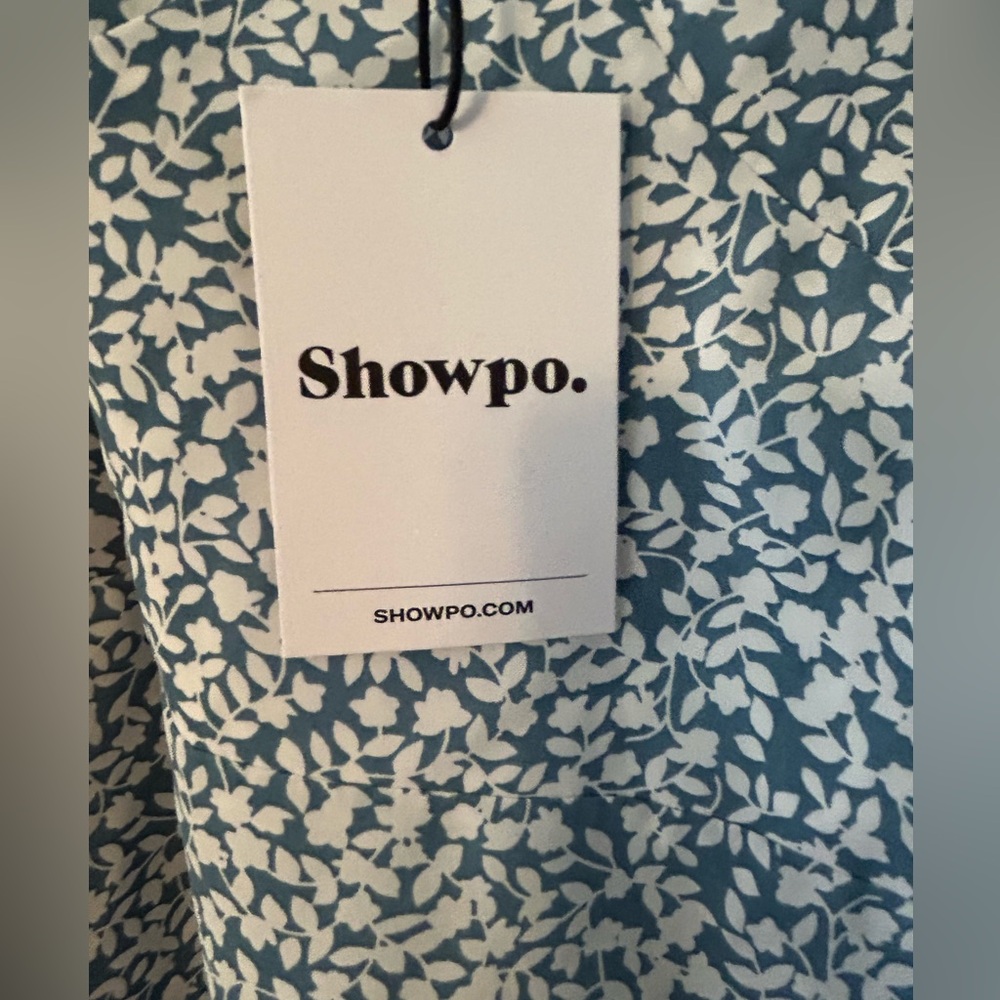 Brand new with tags showpo dress. The dress is mid length and is a size 6.